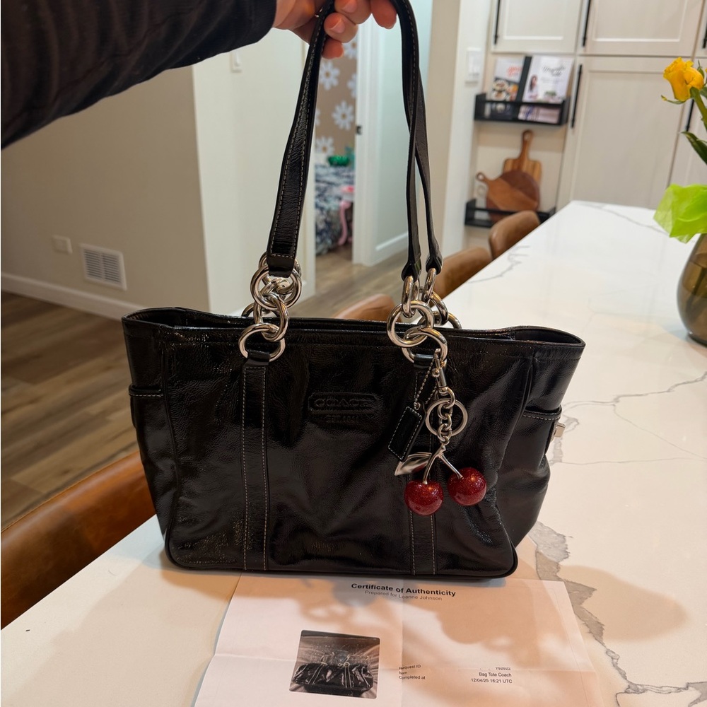 Coach vintage Authenticated Black Leather Shoulder Bag with Cherry Charm